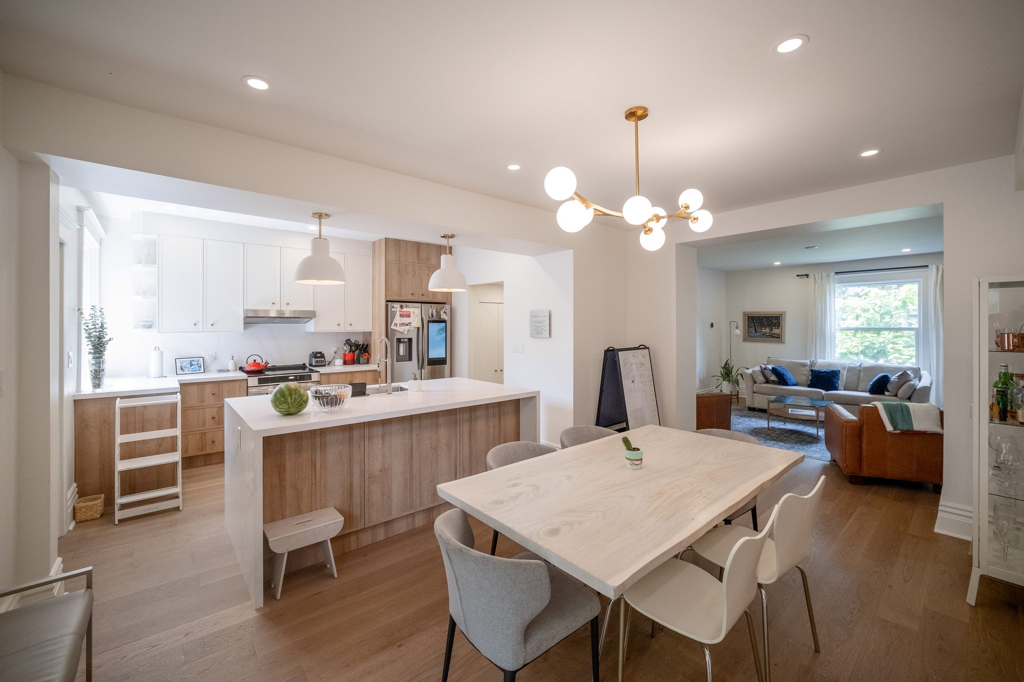 Open-concept kitchen and dining after whole-home renovation near High Park, Toronto, by Doty Design & Build